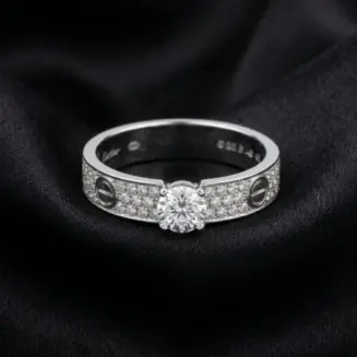 Cartier's, LOVE solitaire, brilliant-cut stone, paved