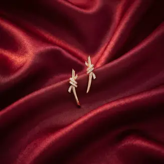 Earrings_made_of_18K_gold_202607041402_result.webp